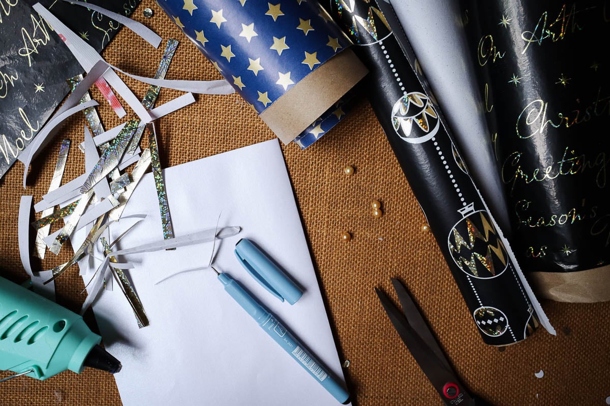 Wrapping paper, pen and glue gun