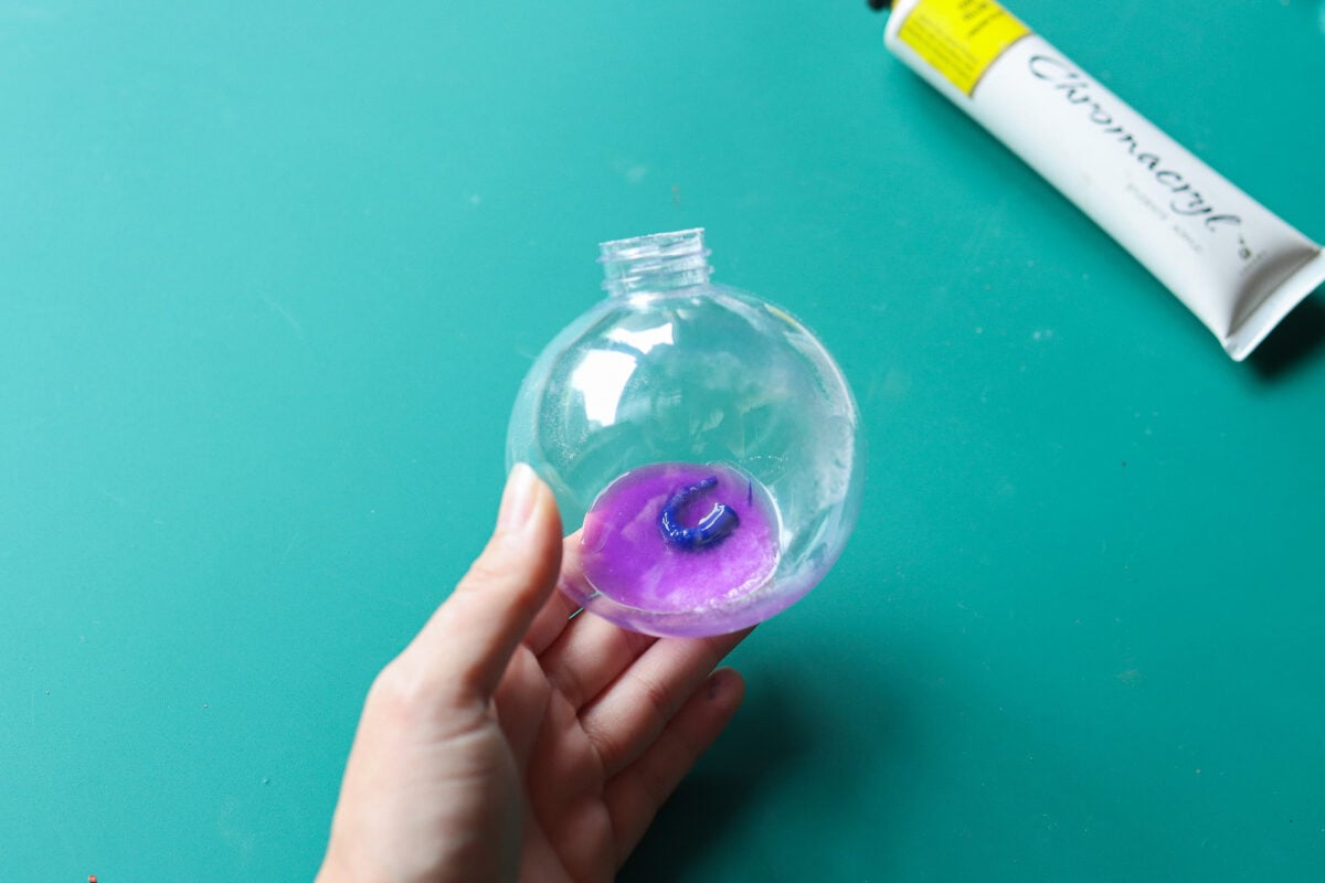 Christmas bauble with acrylic paint inside it
