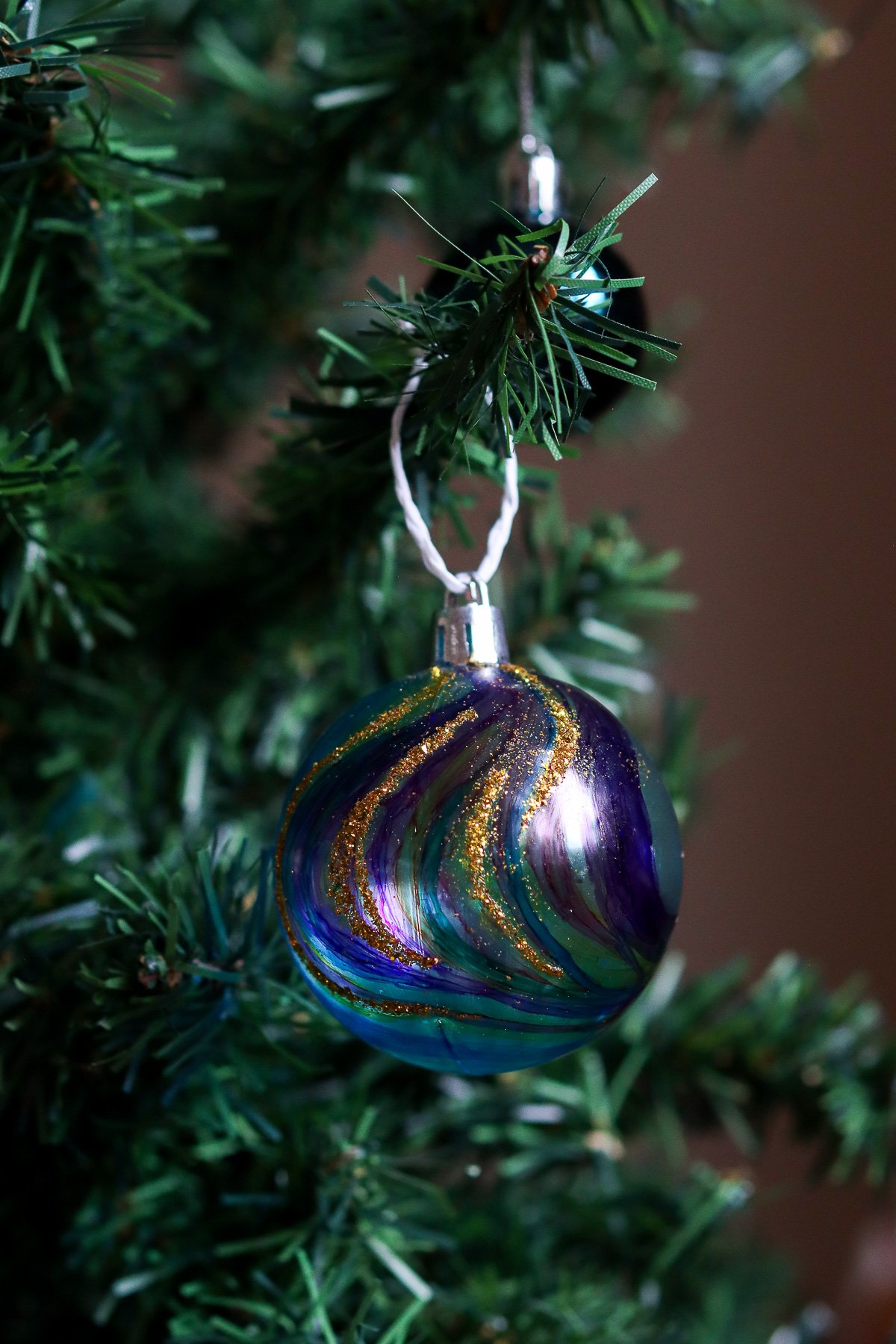 Homemade galaxy Christmas ornament made with markers