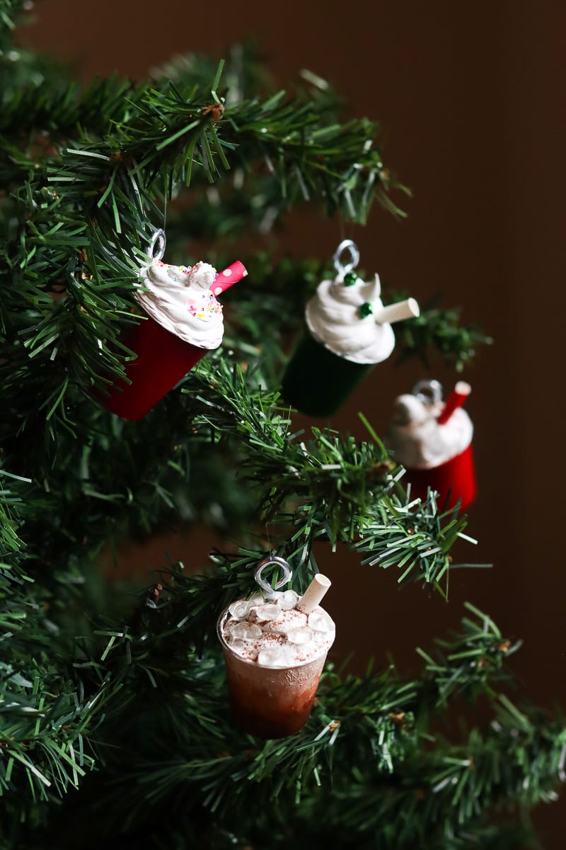 Handmade drinks Christmas ornaments on a Christmas tree.