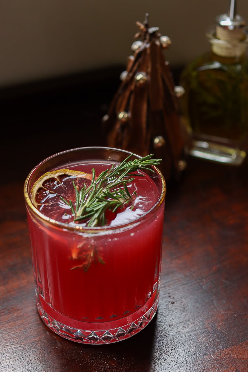 Cocktail with rosemary sprigs